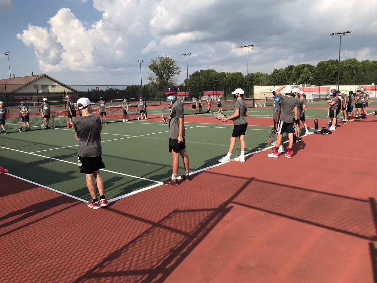 CGMensTennis's tweet photo. Central vs. North Middle School Matchup tonight. Great job by seniors Ryan Wiseman and Luke Embrey giving a few words of wisdom before the match. #FutureIsBright #TrojanNetters https://t.co/vOTXdF2rvV