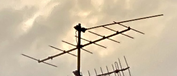 Hence we see two antennas: the lower one is for Band 3 (most likely for watching ITV) and then above it, the single long bar is what’s left of the Band 1 antenna for watching the BBC. A lower frequency needs a physically larger antenna, and the big Band 1 ones often fell apart.