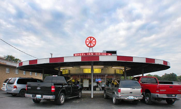 The widening mindset even destroyed early-car era cultural landmarks, like the Wheel Inn Drive-in, in Sedalia, MO. MODOT had to tear it down in order to widen a turning lane, so Sedalia lost a landmark.