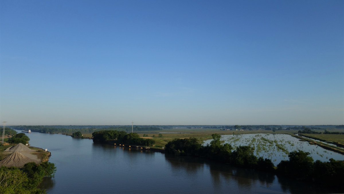 It was the swamp on the side of I-310, the bridge connecting Destrehan to Luling. Miles of 2 lane roads with lush green trees, railroad tracks, & sugar cane fields. Factories & bridges that have seen better days, closed stores that will likely never have another tenant.