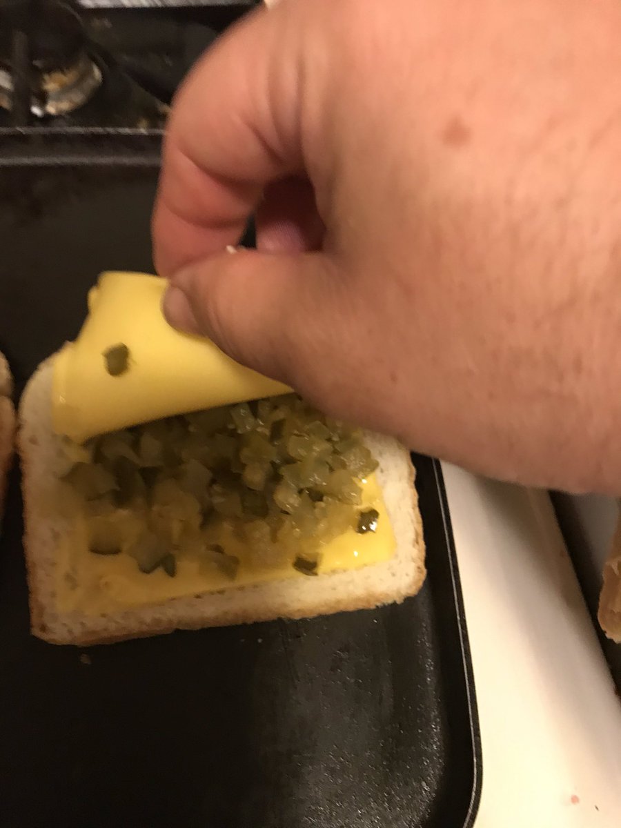 toddly42002's tweet photo. I just put a salad together to eat because I only had a bowl of cereal around noon.  Just about to eat, and someone decides they want a grilled cheese.  So I made one for myself as well.  Mine is one the right with the pickle chips.
#GrilledCheese
#CookingWithTodd https://t.co/hyGkxwldA3