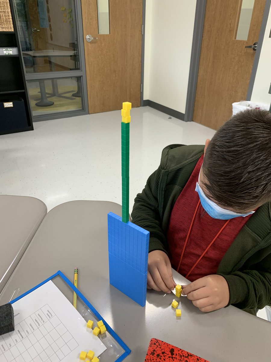 RachelReichert4's tweet photo. My students had a blast getting creative building structures with base 10 blocks today! I gave them a number and they had to create a structure that stood on its own using only those blocks. #just4kids https://t.co/Y7rvhpTUp0