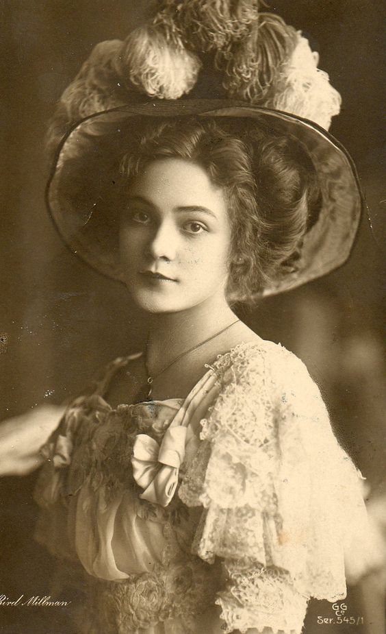 Edwardian “Merry Widow” hats featured wide brims, and were adorned with large feathers.