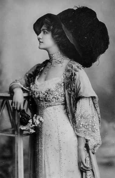 Edwardian “Merry Widow” hats featured wide brims, and were adorned with large feathers.