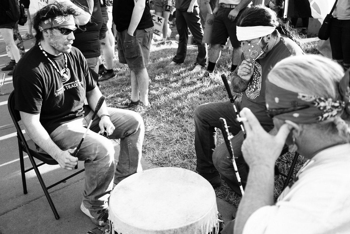 Indigenous comrades are still singing - and folks are listening and standing quietly