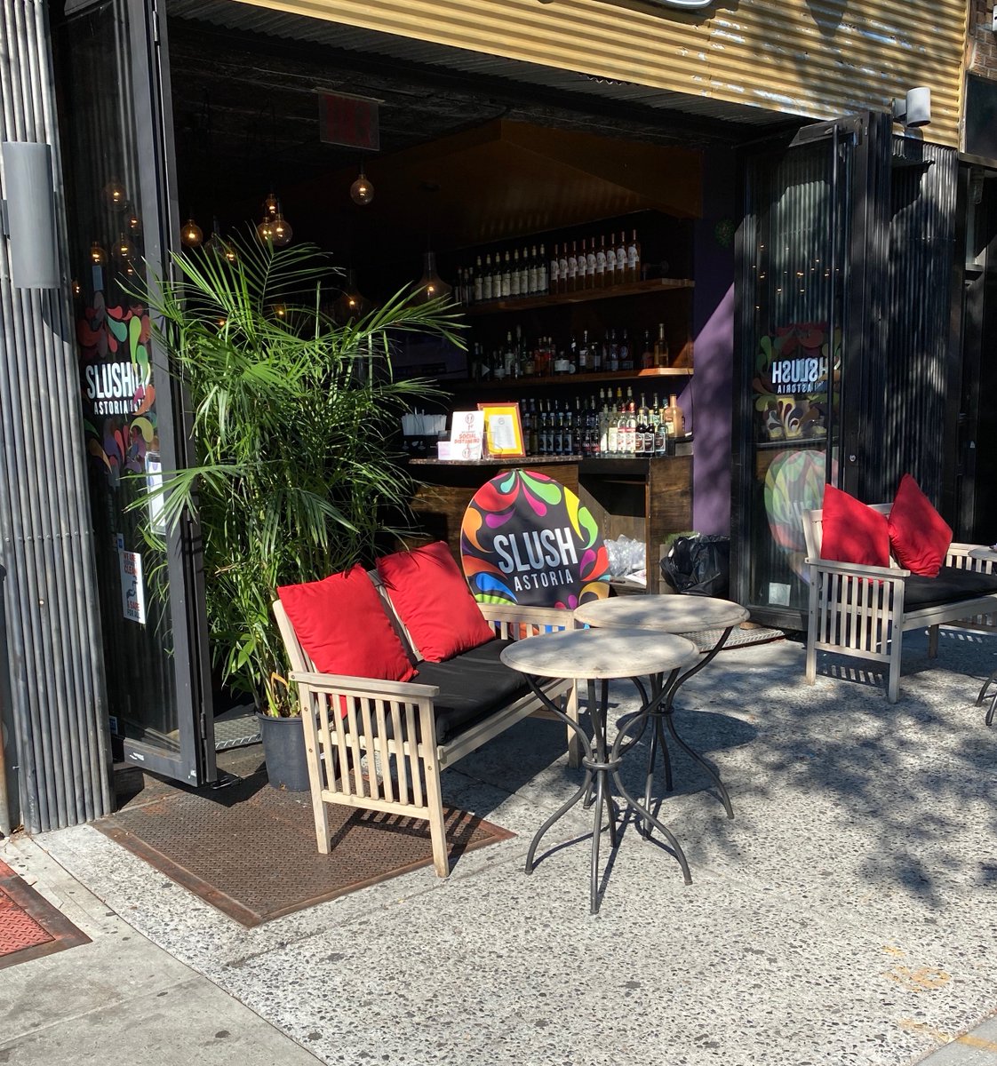 SlushAstoria's tweet photo. We have beautiful sidewalk seating for you to kick back and enjoy the sun (or the moon) and a custom-blended booze slushee at #SlushAstoria #30thAvenueAstoria #Astoria Check out our menu at https://t.co/jmSiTJnG1o https://t.co/mH2JCSdJeD