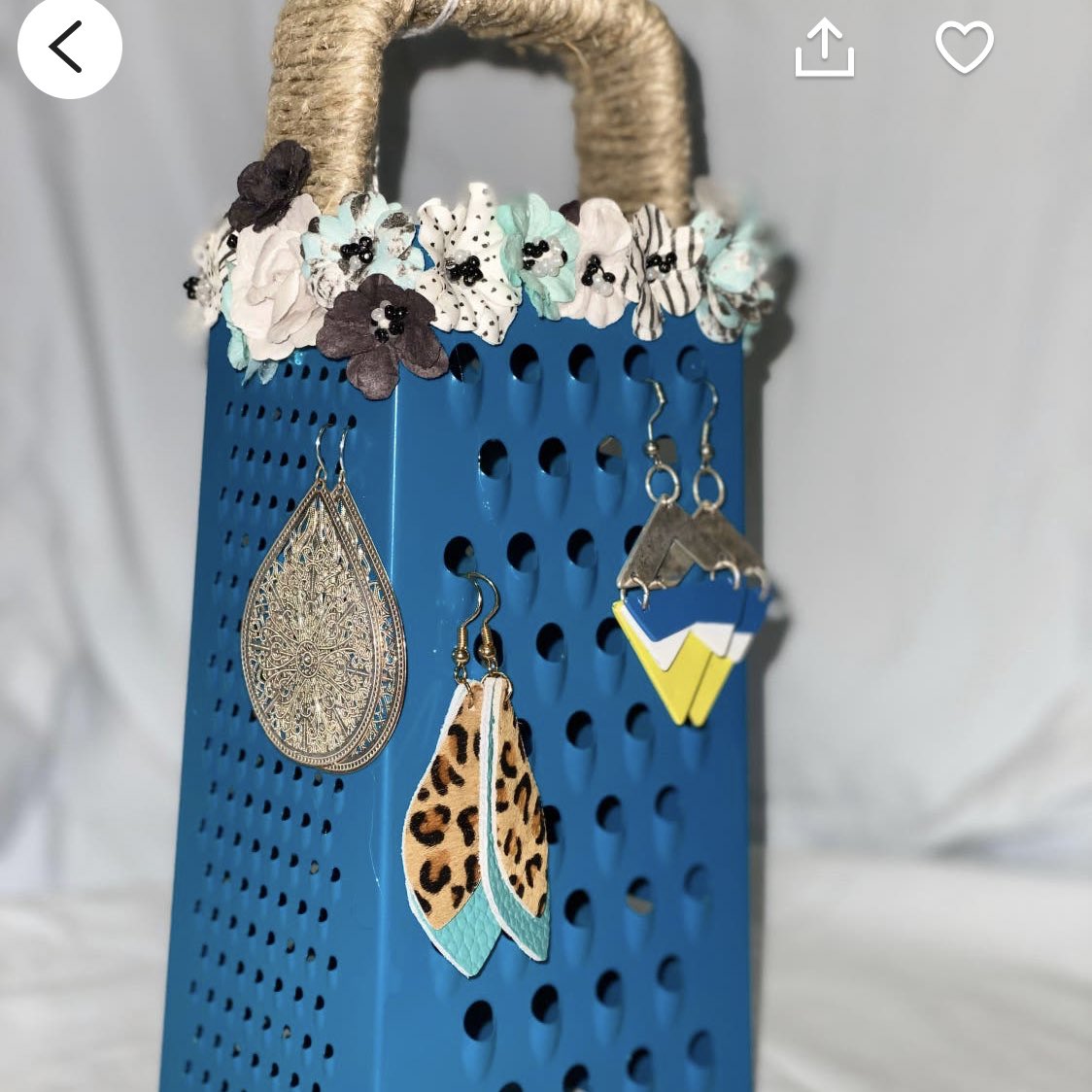 wish i had the confidence of the woman trying to sell this cheese grater as an earring rack on etsy