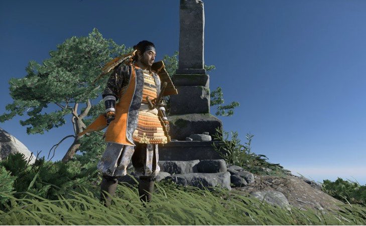 The Orange Coat He’s Wearing Is A “Jinbaori” Worn By High Ranking Samurai Of The Sengoku Period Only.   The Right Looks Like He’s Wearing Mass Produced Folding Light Armor Of Sengoku Period Non-Samurai “Ashigaru” (Light Foot Soldiers).