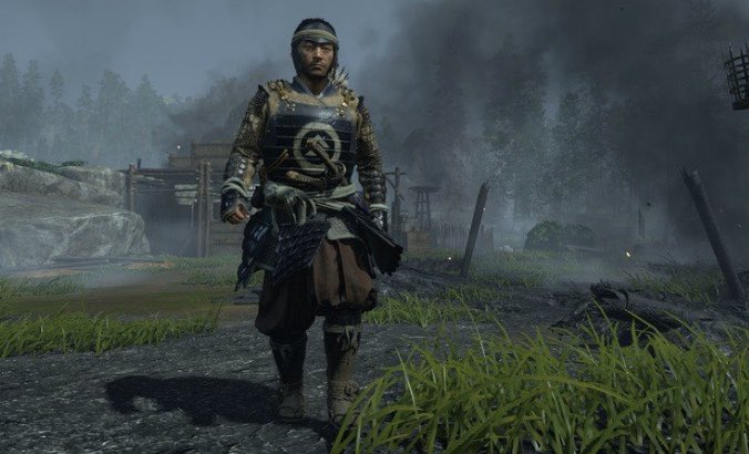 The Orange Coat He’s Wearing Is A “Jinbaori” Worn By High Ranking Samurai Of The Sengoku Period Only.   The Right Looks Like He’s Wearing Mass Produced Folding Light Armor Of Sengoku Period Non-Samurai “Ashigaru” (Light Foot Soldiers).