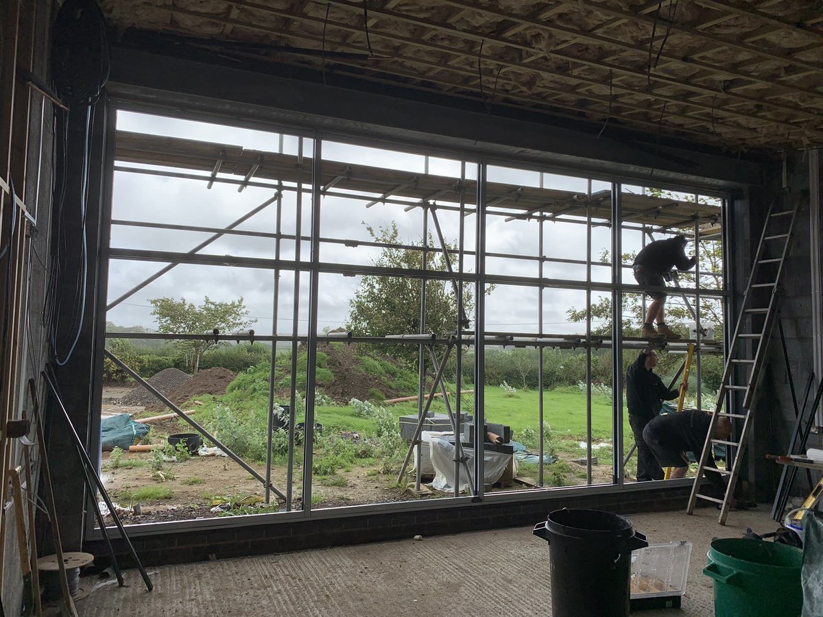 This should let the light in!  ☀️
Renew SW Ltd are currently fitting this 6.5m x 3.4m Anthracite Grey aluminium feature window into a new day room for a ‘truly local’ residential home.