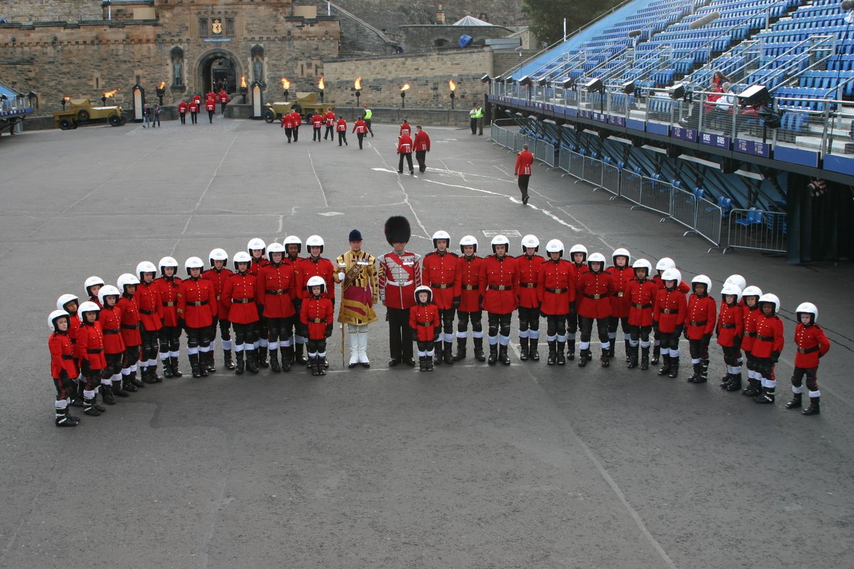 The IMPS proudly pose for a picture with DM Scott Fitzgerald and one of his drummers who both had a great rapport with our youngsters.The IMPS congratulate you on the longevity of your service as a DM. The Imps were due at the REMT this year our 50th Anniversary, so sad