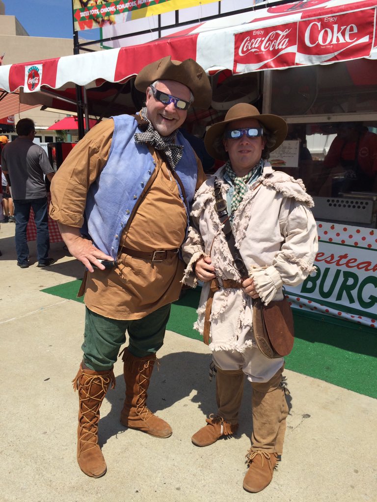 These are historic interpreters Alan and Tim (as KY founders James Harrod and Daniel Boone). The cardboard eclipse glasses made them look like time travelers.