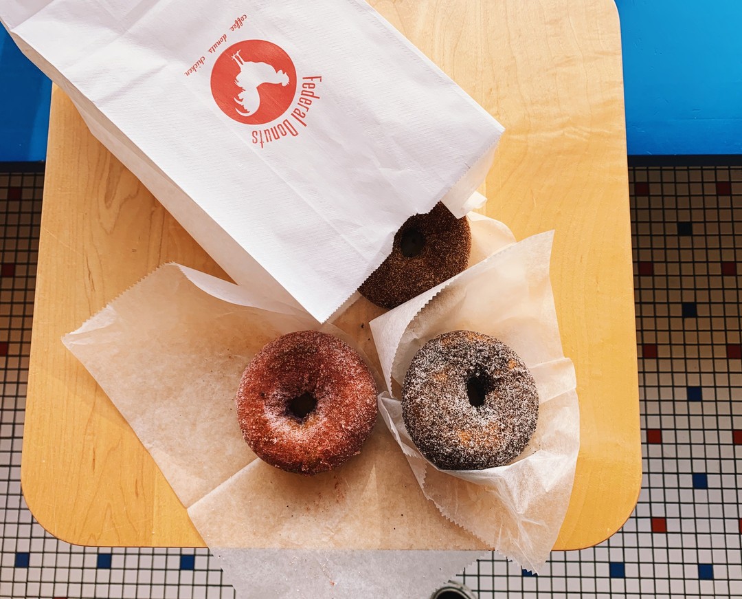 Hot Fresh donuts pulled straight from the fryer and tossed in our three sugar & spice blends juuuust for you 🥰♨️ Why not treat yourself to one of each⁉️⠀ Order for pickup today: federaldonuts.square.site ❤️💙