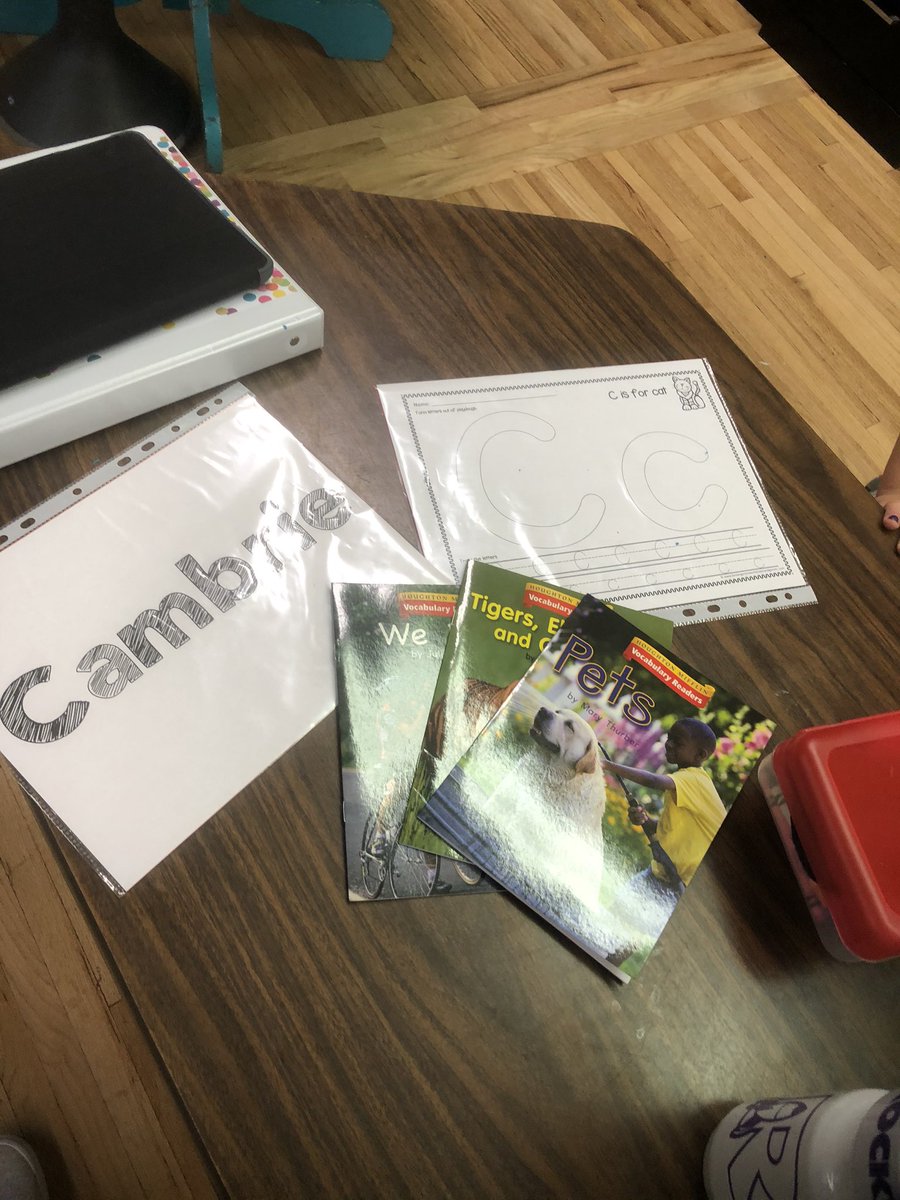Literacy stations may look different this year... but we still have choices! Students not working with a teacher at the moment can choose books, play doh name/letter mats, or letter tracing! #choices #kinders #weROCKet