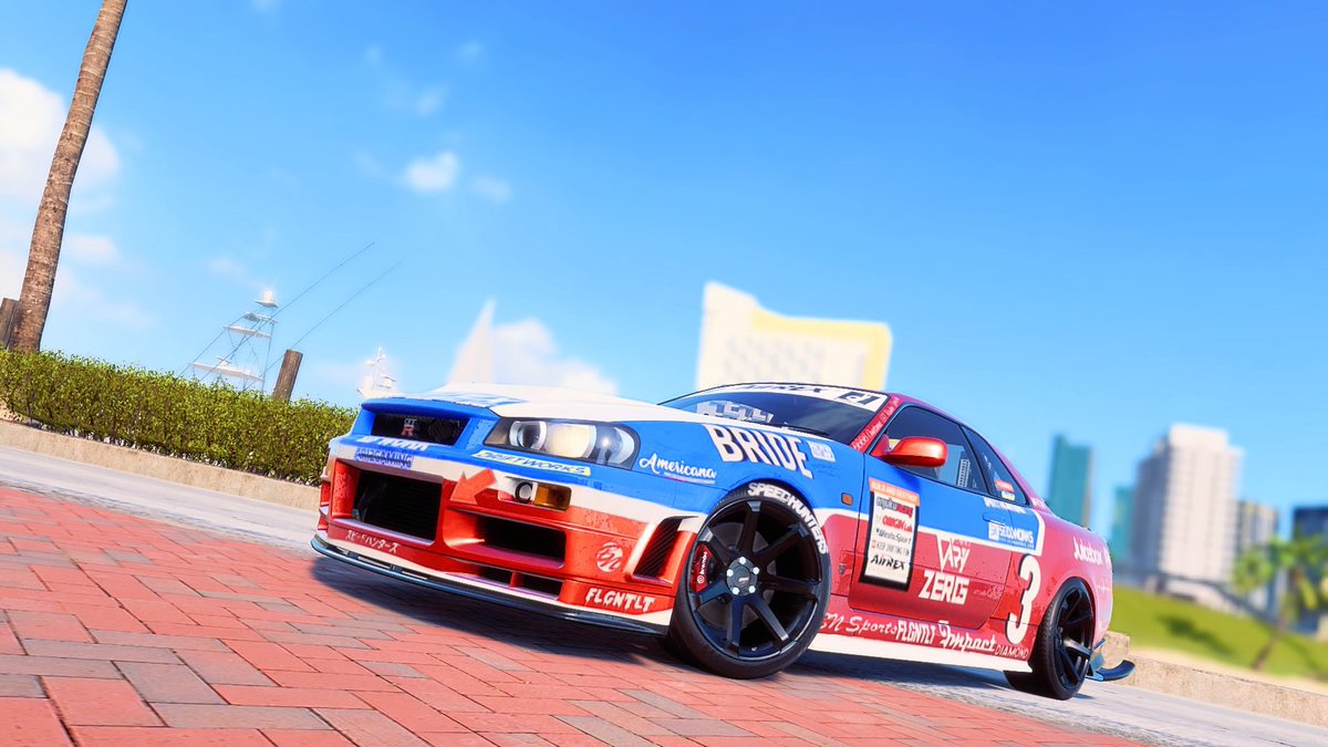 手塚さんのR324と 野村 圭市さんのER34の ボディペイントを再現し てみ