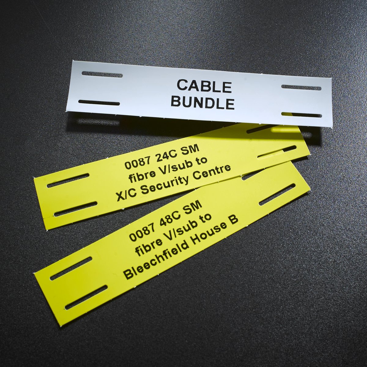 Wrap-around Cable Labels, available in various colours and sizes. Printed Tie-on Labels are made from polyester, available in either yellow or white. They are tied on to a single cable or cable bundles using cable ties. Please refer to our website for more info.