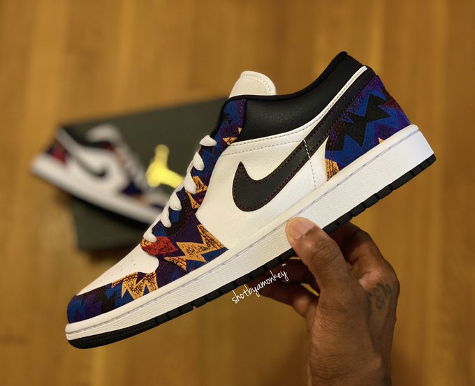 jordan 1 low nothing but net on feet