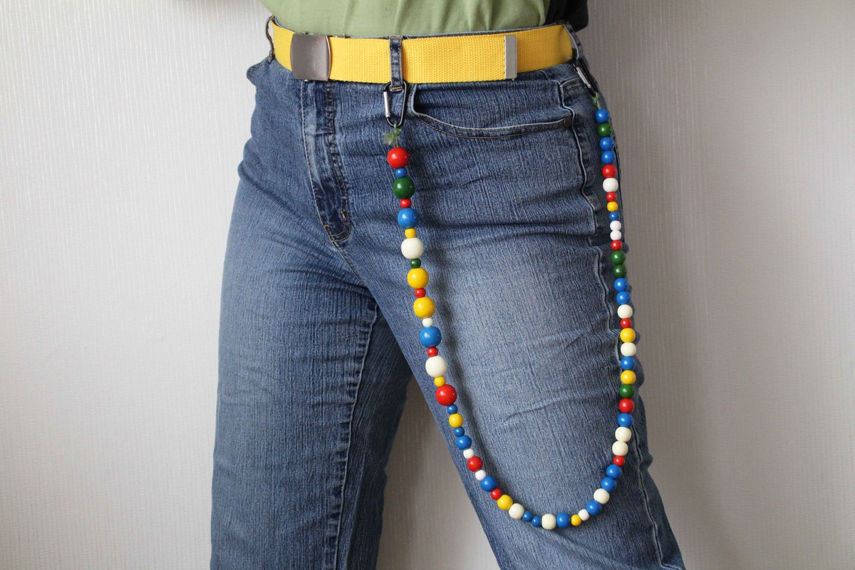 LONG COLOURFUL JEANS CHAIN - thrifted and upcylced materials - €14.50 with free shipping to the Netherlands. International shipping possible https://www.etsy.com/listing/846615669/long-colourful-jeans-chain-wooden-beads?ref=shop_home_active_15&frs=1&cns=1