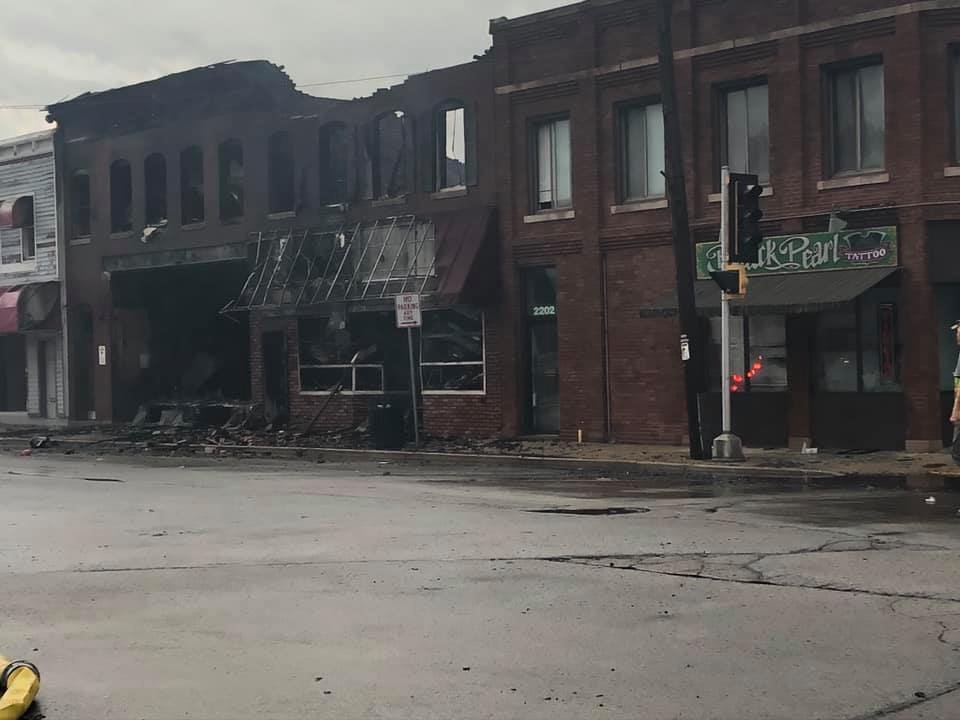 Lower storefronts and Upper apartments burnt to a crisp.This is little part of town is referred to as "Uptown" and largely consists of minority and lower income residents.