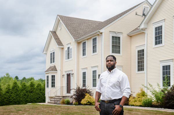 The value of Stephen Richmond’s home in a Hartford, Conn., suburb jumped after he removed family photos and movies posters, and had a white neighbor stand in for him during a second appraisal.
