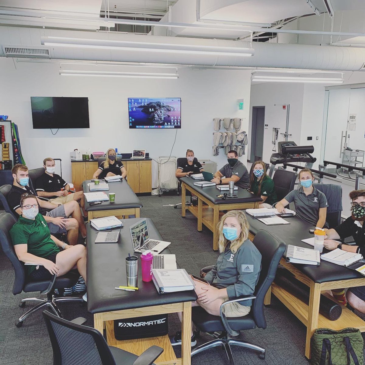 EMUSportsMed's tweet image. 👋 The Gang’s All Here❕
The EMU sports med staff is FINALLY back for our annual staff orientation! Day☝️is reviewing/updating policies &amp;amp; meeting with our awesome resources and support staff!🦅 We’re SO excited to be together(while still spaced out &amp;amp; masked up) and ready to work!