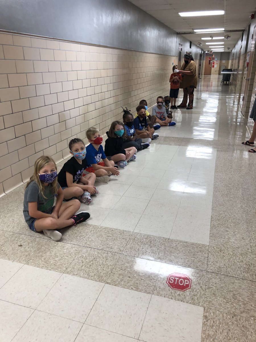 Check out this group of 2nd graders.  Masks in place and waiting turns for restrooms.  These kiddos are amazing and super flexible with new procedures!