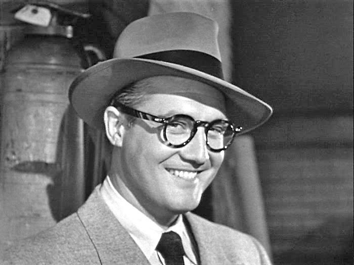 When Superman — created by a couple of Ashkenazi Jewish teenagers in the 1930s — an immigrant who escaped the death of his people by coming to America, goes to the big city under the WASPy name "Clark Kent", he slicks back his dark, curly hair ... often hiding it under a fedora