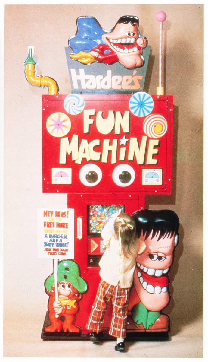 While it's not from the same series, 'Point of Purchase' by Robert Konikow (1985), collects some interesting displays from that era; including 'fast food mansard' Frito-Lay shelving, Atari demo kiosk, synthwave dog food, and a terrifying Hardee's 'Fun Machine'.