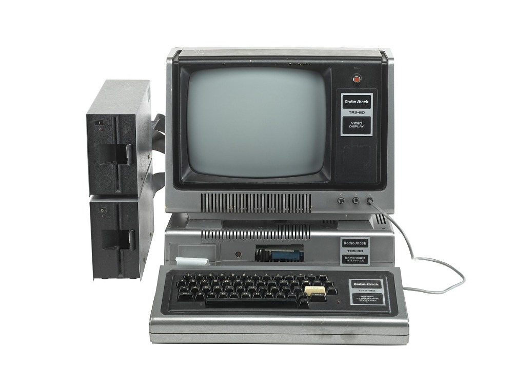 The Trinity, 1977. The Apple II, PET 2001, and TRS-80 were released the same year. They became known as "The Trinity" as they competed for the PC market.