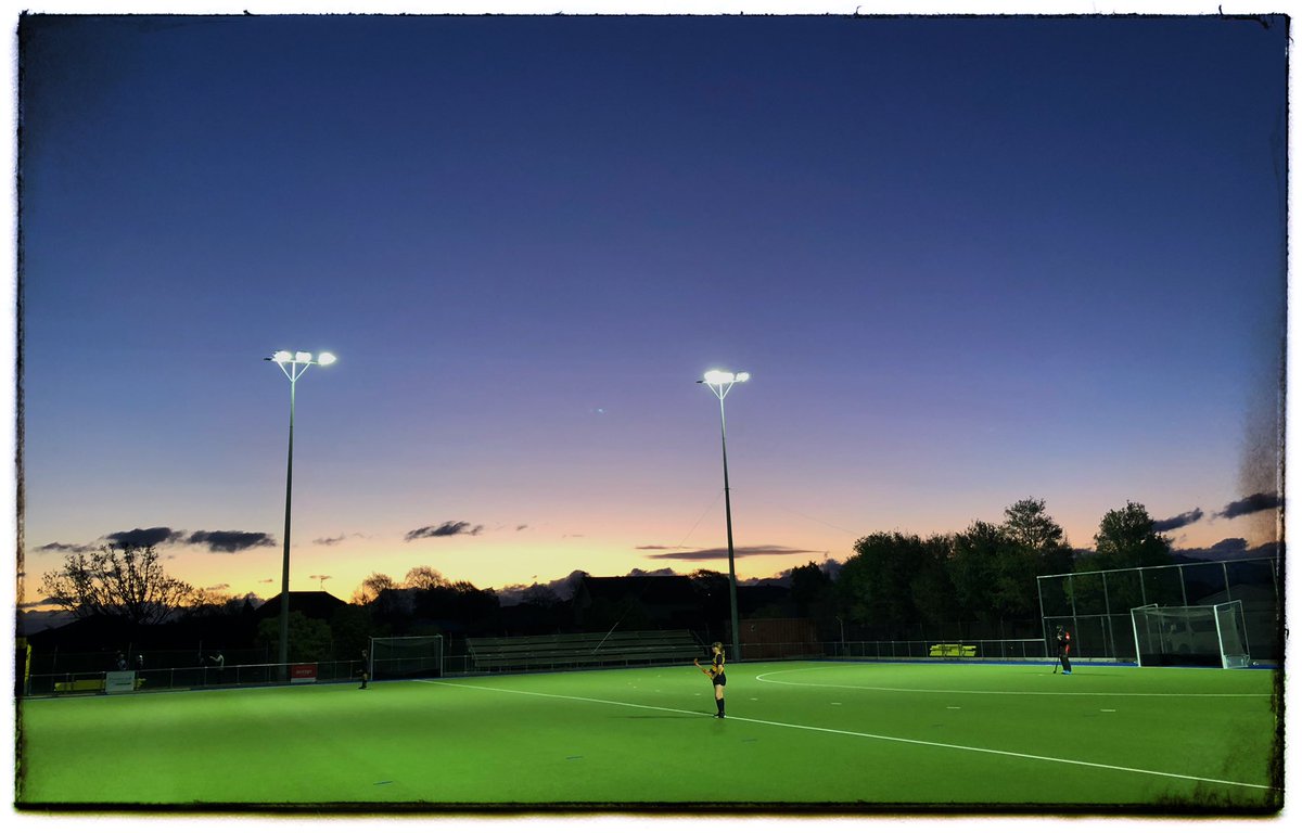 Tilly and the combined Fairhall/St Marys hockey team in action at sunset tonight