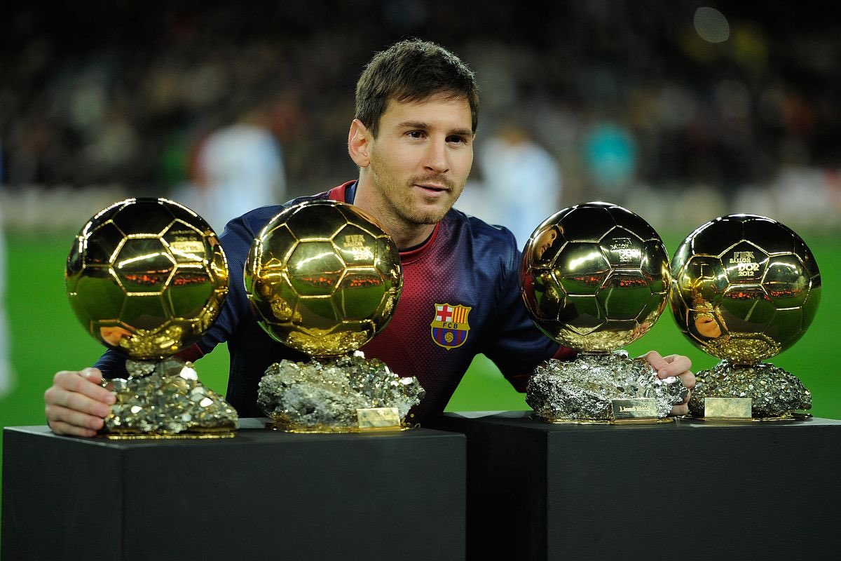 Three successful seasons later in 2012, Messi wins four consecutive Ballons d'Or, making him the first player to win the award four times AND in a row.