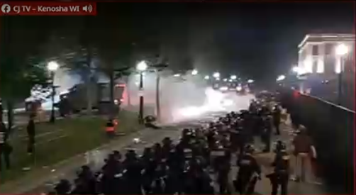 BREAKING: Riot police have now created a formation outside the fence by the  #Kenosha County Courthouse, to prevent rioters from approaching closer.