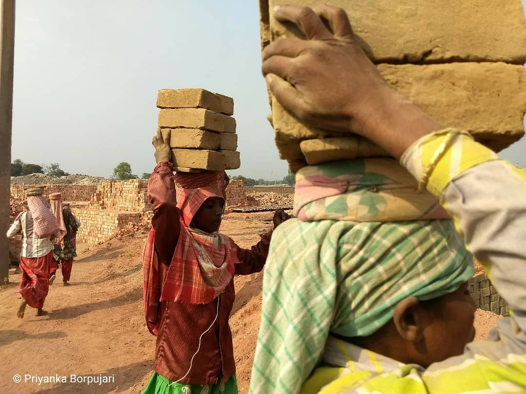10 unbaked bricks on the head.Several sprinting trips to the earth oven with these.Rs 136 per 1,000 bricks.Eight hours a day.Geramari, Assam.The human body is the cheapest commodity.On the  @outofedenwalk in 2019 with  @PaulSalopek #EdenWalk  #slowjournalism