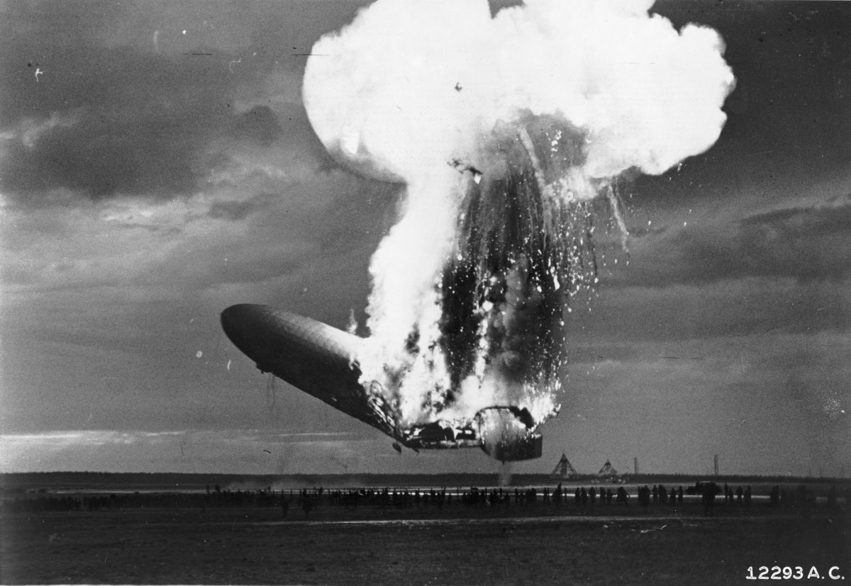 Since the air was highly electrified due to the imminent storm, and since the wet ropes grounded the Hindenburg, static electricity ran from the steel mooring mast, through the conductive ropes, and into the Hindenburg, causing the hydrogen leak to explode.