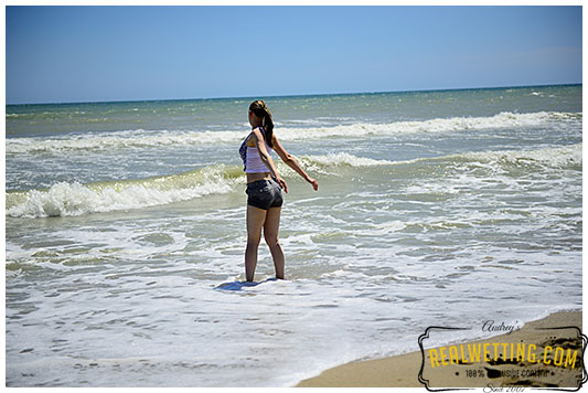 Realwetting's tweet photo. It's summer, the sea is making waves and Claudia didn't resisted to play in them. When you play and enjoy something you forgot also to go and pee and usually wet yourself.https://t.co/XWJmSKThdX #pissingplayinginthewaves #wettingshorts #beachpee #sheforgottousethetoilet #seapiss https://t.co/TTwS8hVnUj