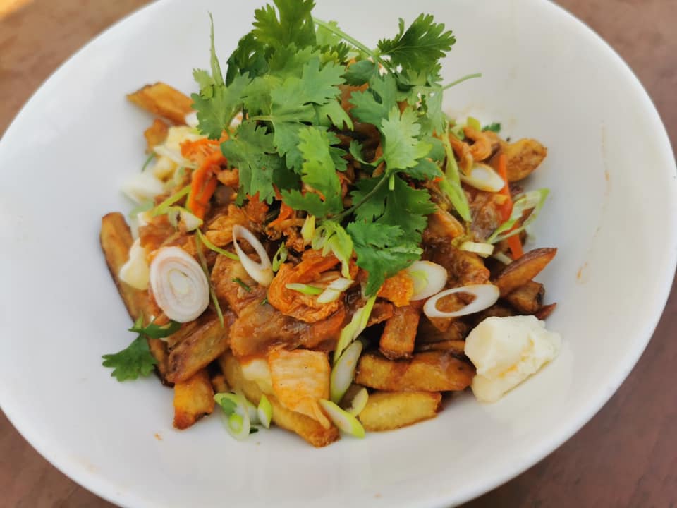 One of our features this week is a Vegetarian Kimchi Poutine! This #glutenfree dish can also be made #vegan! 🍽 Join us on our patio today or order takeout! #kwawesome #explorewr #waterlooregion #uptownwaterloo #foodie