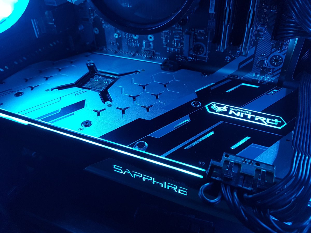 SapphireTech's tweet photo. Our #SAPPHIRE NITRO+ #RX5700XT backplate looking calm and cool in these shots by @DJJaROficial
.
.
 #NITRO #gamingsetup #PCsystem #PCrig #custombuild #graphicscard #GPU #SAPPHIREnation #SAPPHIRETech #AMD #Radeon #hardware #PCgaming #gaming #NITROcharged #RGB #ARGB #NITROglow https://t.co/d1RB8ouCT1