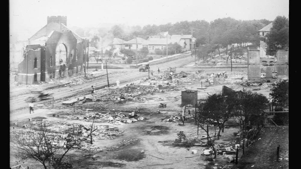 Turing the Tulsa race massacre, National Guardsmen as well as local police and government officials, joined forces with white supremacists to arrest Black residents, burn down Black-owned businesses and murder more than 150 Black Tulsans.