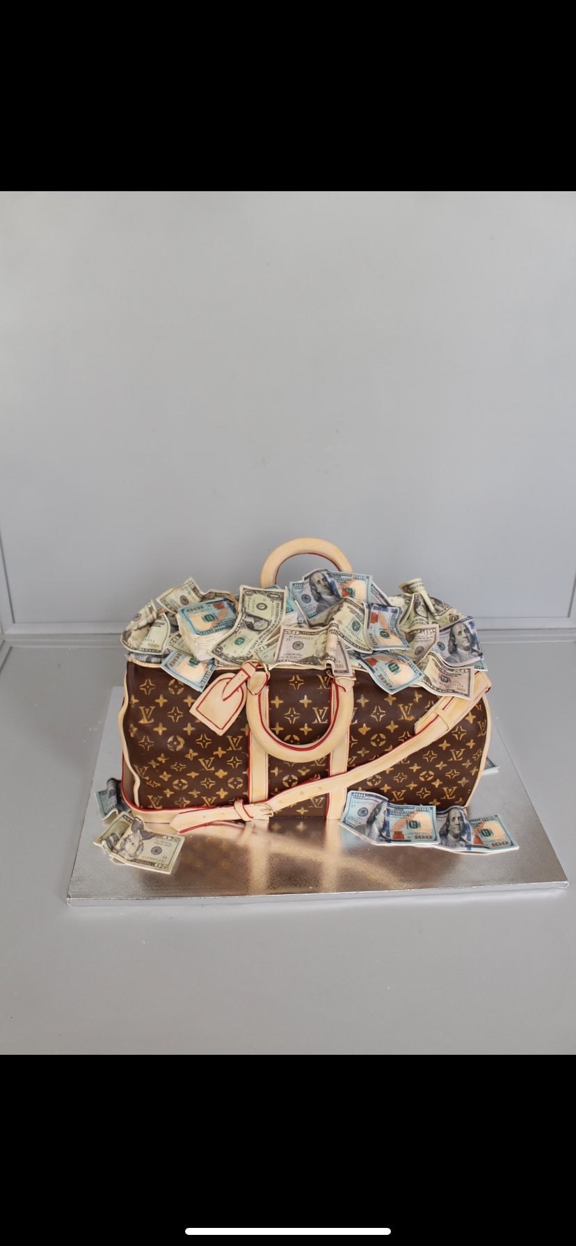 Louis Vuitton suitcase cake full with money