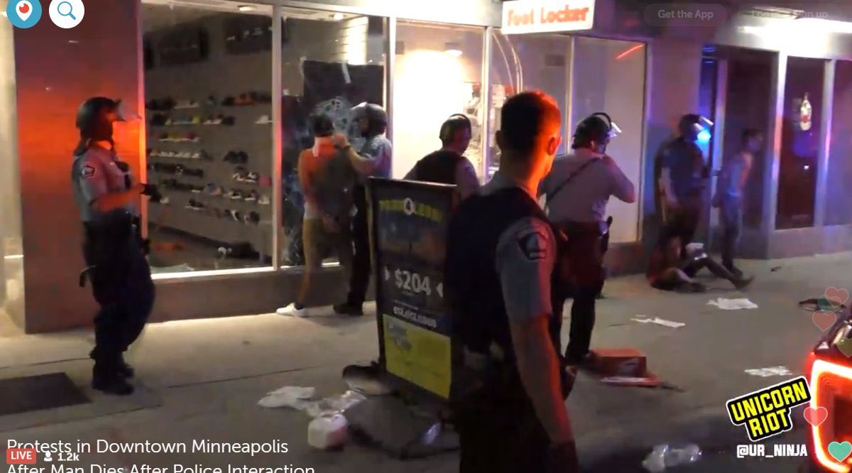 BREAKING: Riot police macing and arresting multiple looters at a broken Foot Locker in  #Minneapolis,  #Minnesota