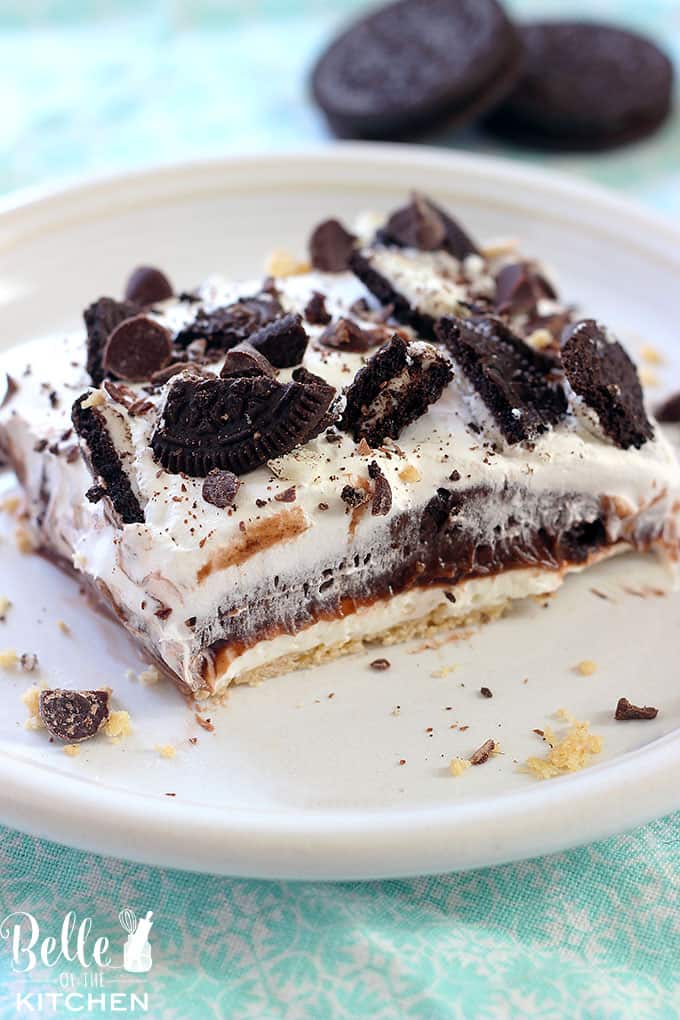 bellekitchen's tweet photo. Oreo Four Layer Dessert – an irresistible dessert made with layers of whipped cream, pudding, Oreos, cream cheese, and a buttery crust. This is a real crowd pleaser! #belleofthekitchen #oreo #fourlayer #dessert https://t.co/pOpTxmLvXM https://t.co/BsgWOYKtbL