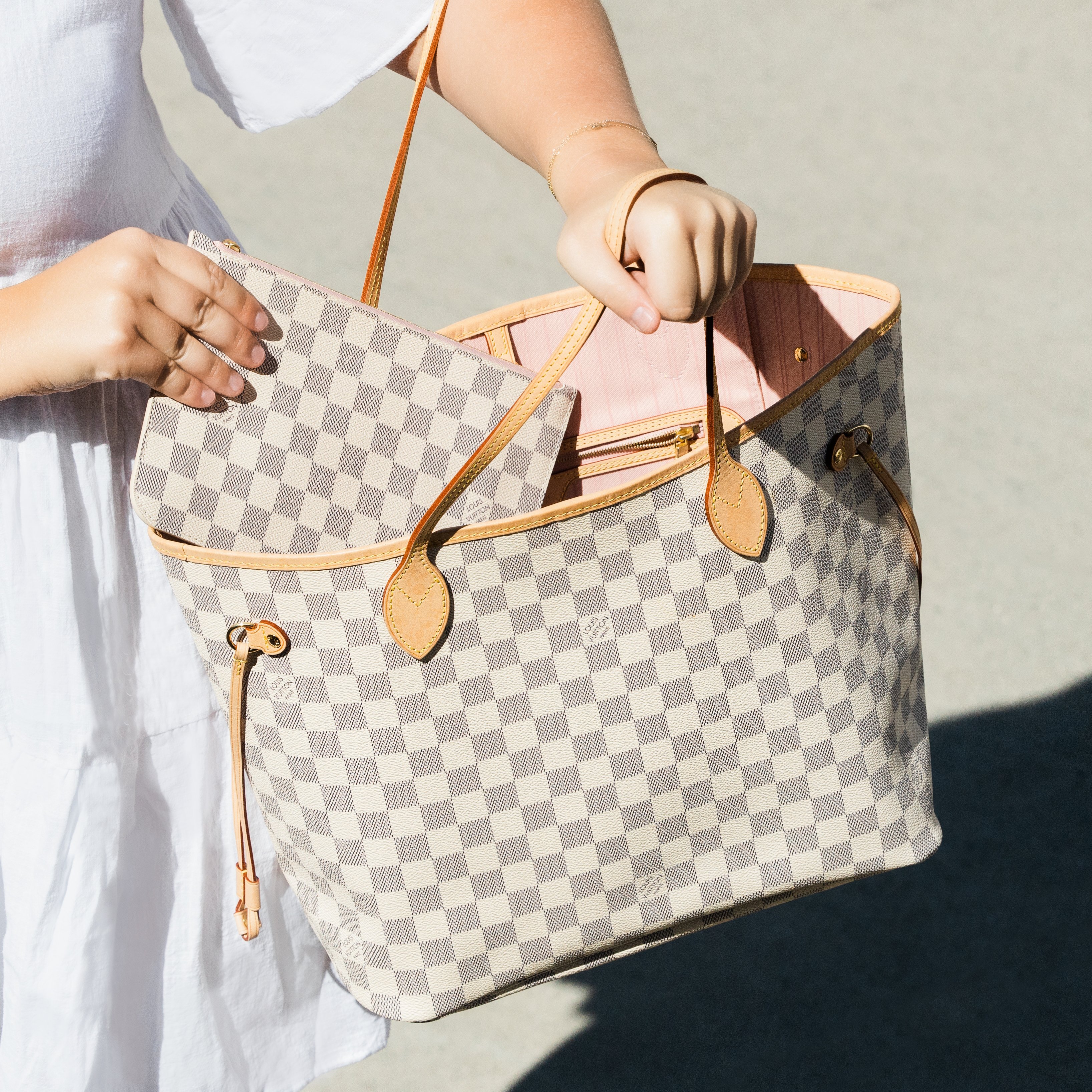 FASHIONPHILE on X: From cerise to beige and even peony, the Louis Vuitton  Neverfull offers a variety of interior colors to choose from. Pictured is a Damier  Azur lined in Rose Ballerine