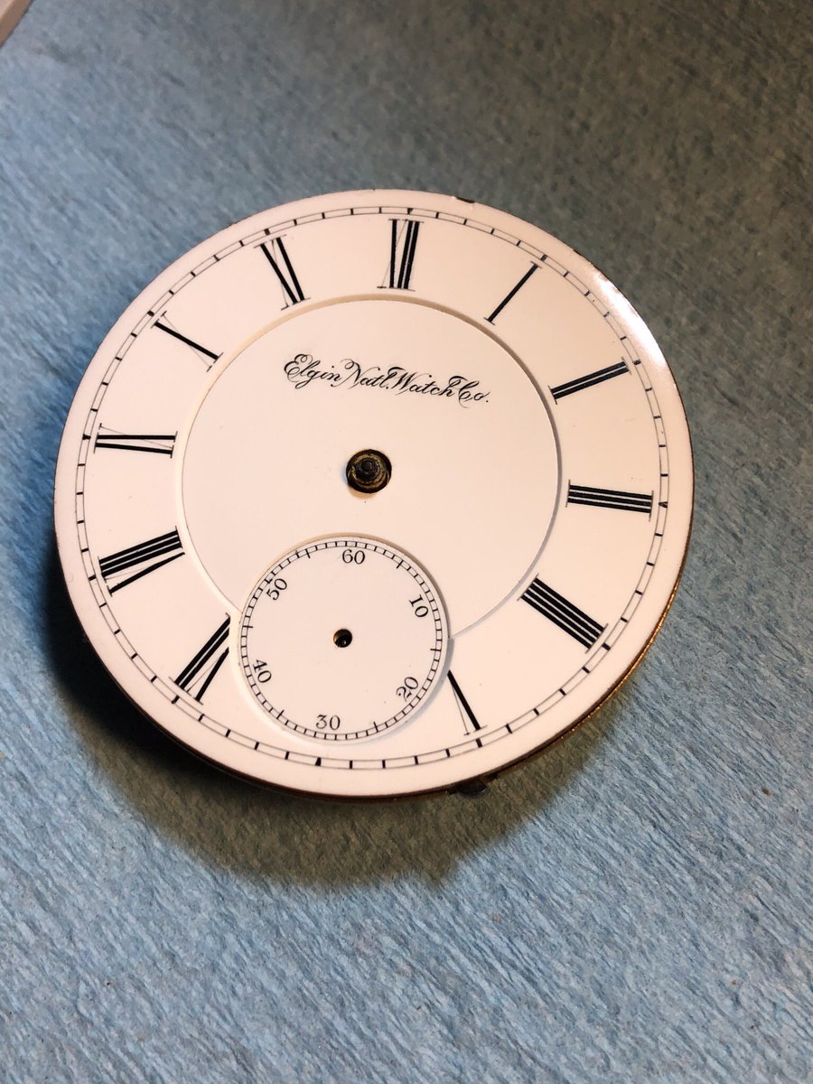 Timebuilder's tweet image. A 100 plus year old 18 size full plate Elgin. You have to put these together up side down and put all the gears into them first then gently drop the upper plate into place. It took many days to restore this old pocket watch.