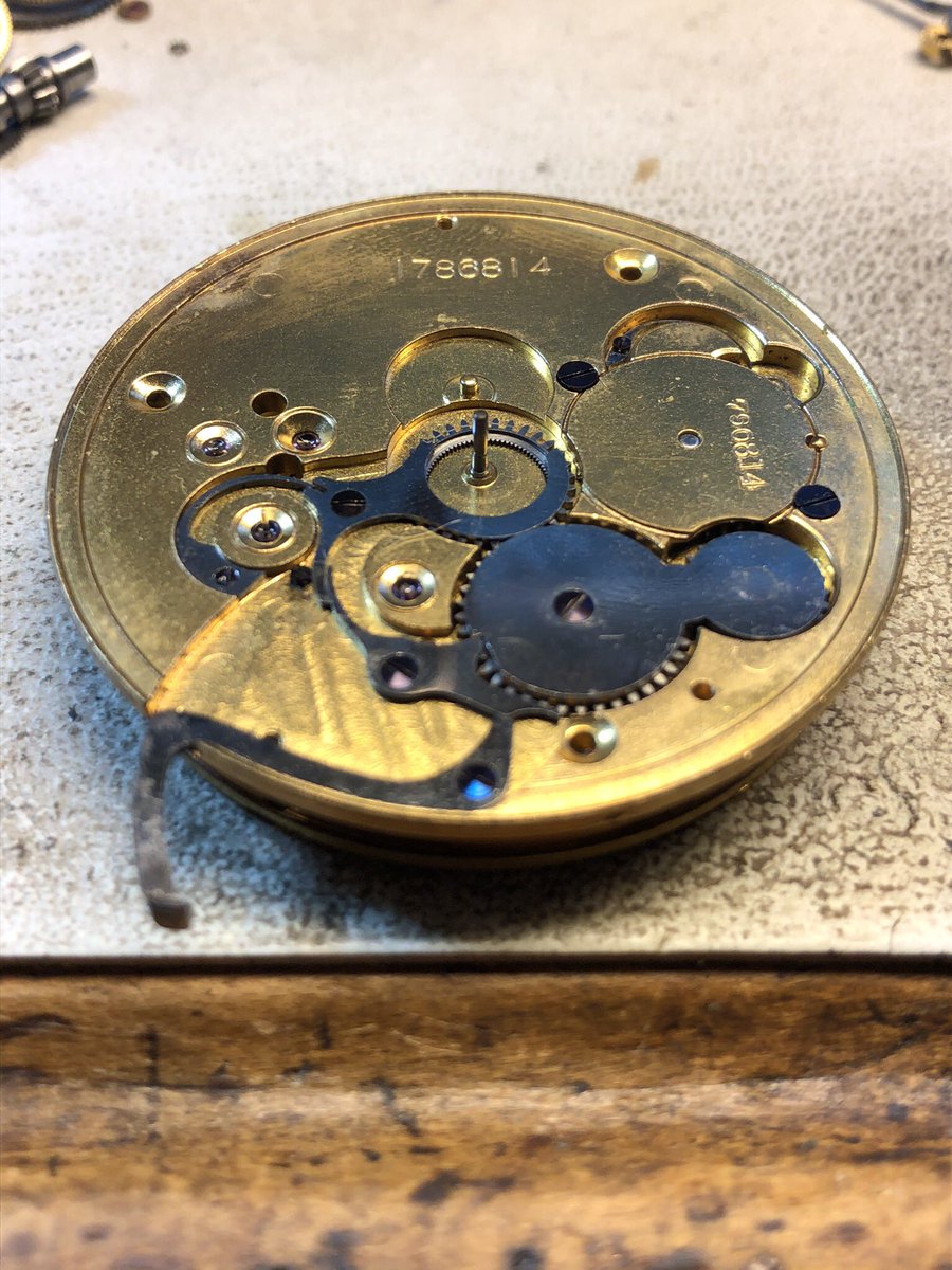 Timebuilder's tweet image. A 100 plus year old 18 size full plate Elgin. You have to put these together up side down and put all the gears into them first then gently drop the upper plate into place. It took many days to restore this old pocket watch.