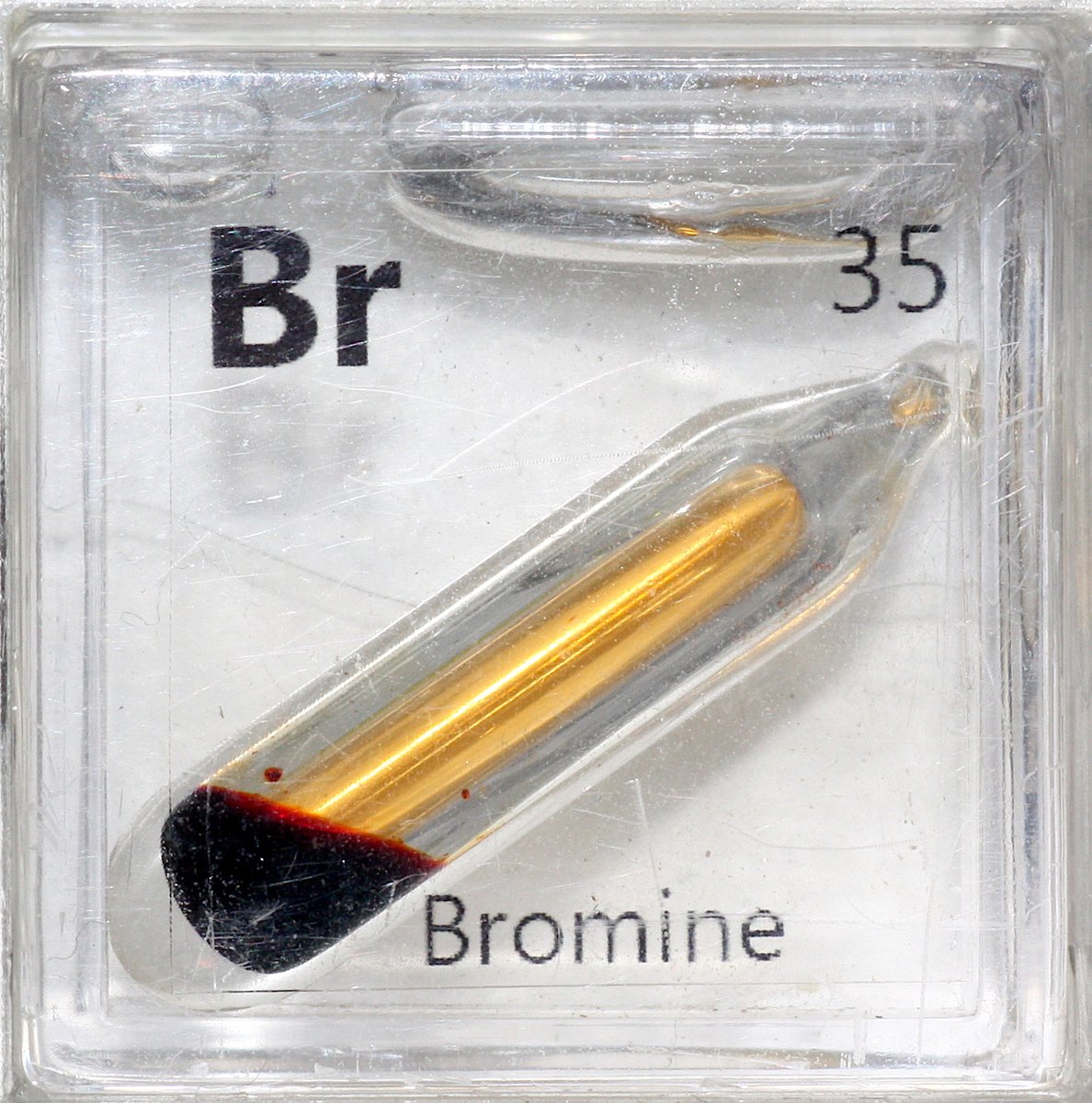 Bromine  #elementphotos. White crystals are strontium bromide (SrBr2.6H2O), which has turned out to be quite deliquescent, so I'll need to come up with another compound option.