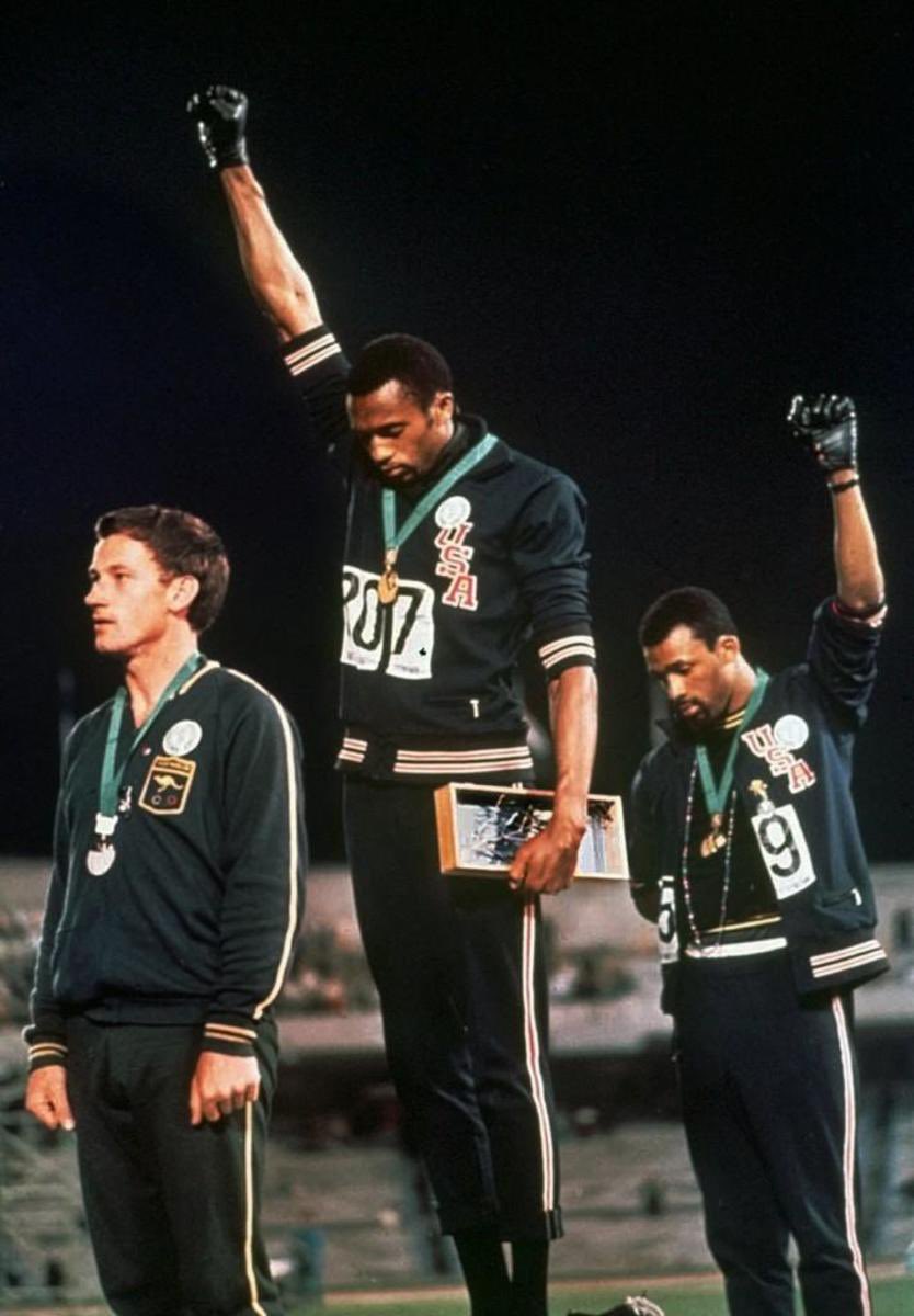 At the 1968 México City Olympics, Tommie Smith and John Carlos raised their fists during the Star-Spangled Banner. Australian Peter Norman has an Olympic Project for Human Rights badge to show solidarity with Carlos and Smith.All three were ostracized upon returning home. (3/n)