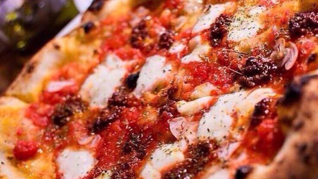 A longtime bestseller for a reason... Our <a href="/salumebeddu/">Salume Beddu</a> Nduja has the perfect balance of heat &amp; sweet. Prepared with tomato, fior di latte, garlic, oregano, and honey 🔥 Join us for dinner this week at Pastaria or order curbside online. Photo via @whiskeyandsoba