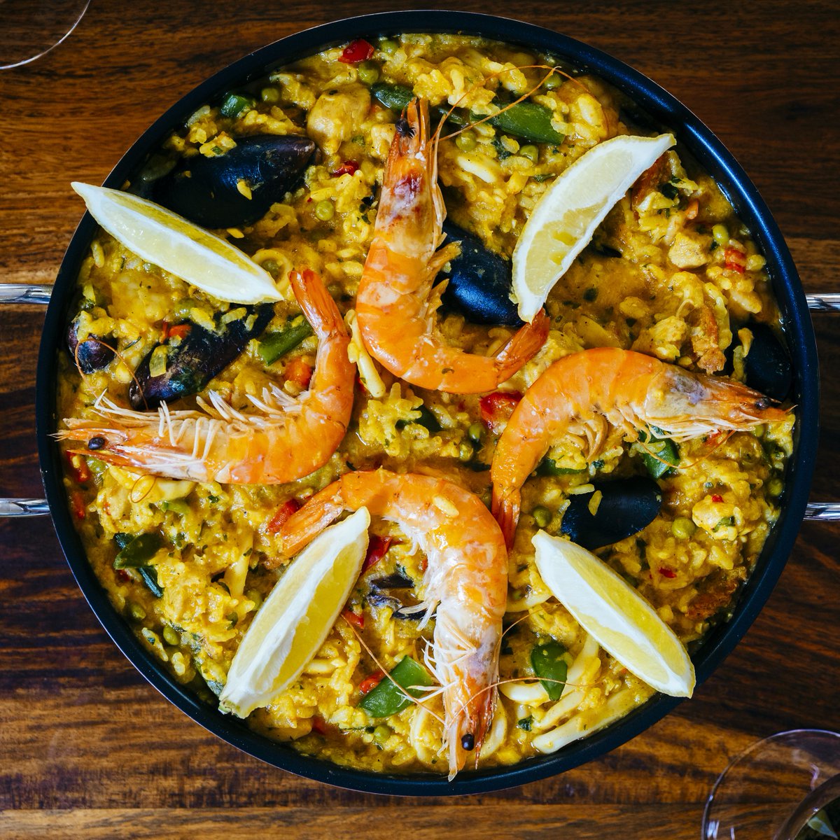 here, for instance - study the prawn at 3 o'clock on the left-hand picture (hairy bikers paella) - it's patently the same as the lowest one beneath the lemon in the pic on the right (jamie oliver)