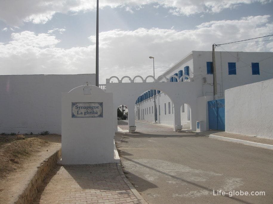 El Ghriba Synagogue was built at the end of the 19th Century by the Jewish community of Djerba, an island off the coast of Tunisia.It was built on the site of a far older synagogue. It is said that this former synagogue was built by a Kohen Gadol who fled Nebuchadnezzar II.