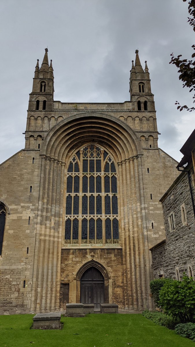 The west front of the Abbey has this enormous arch - it's the only one like it in England - and is otherwise quite undecorated. The slits up the sides are windows - there's spiral staircases inside that bad boy and I wanna climb them So Bad.